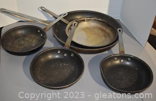 Five Frying Pans 